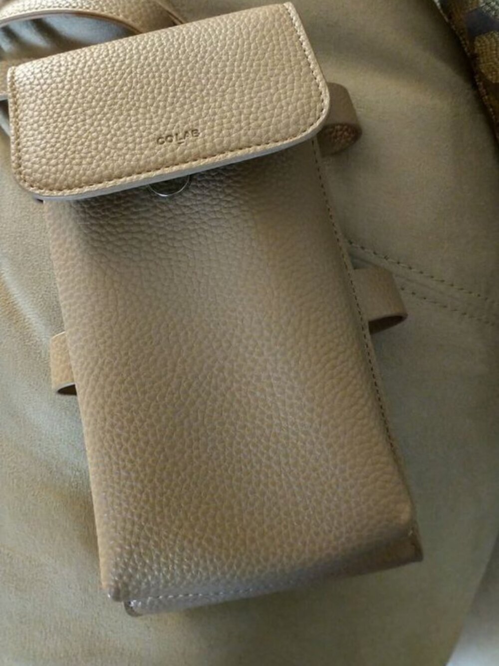 Tan crossbody purse with water bottle holder by Colab